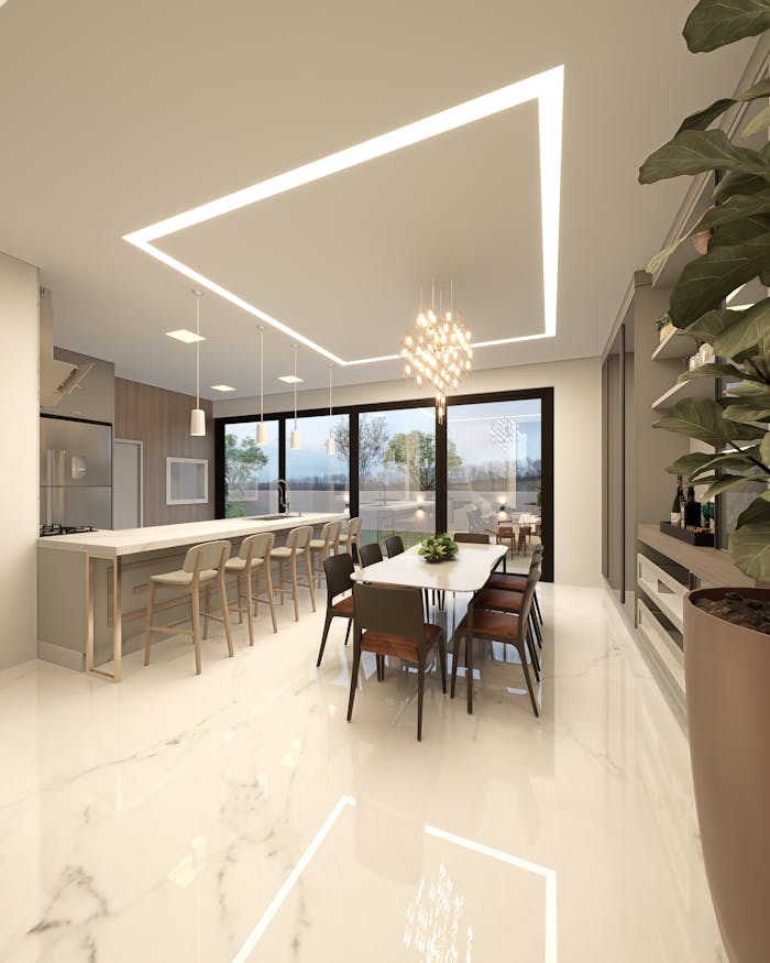 services-03 Sleek and elegant modern kitchen and dining area with natural lighting and contemporary design.